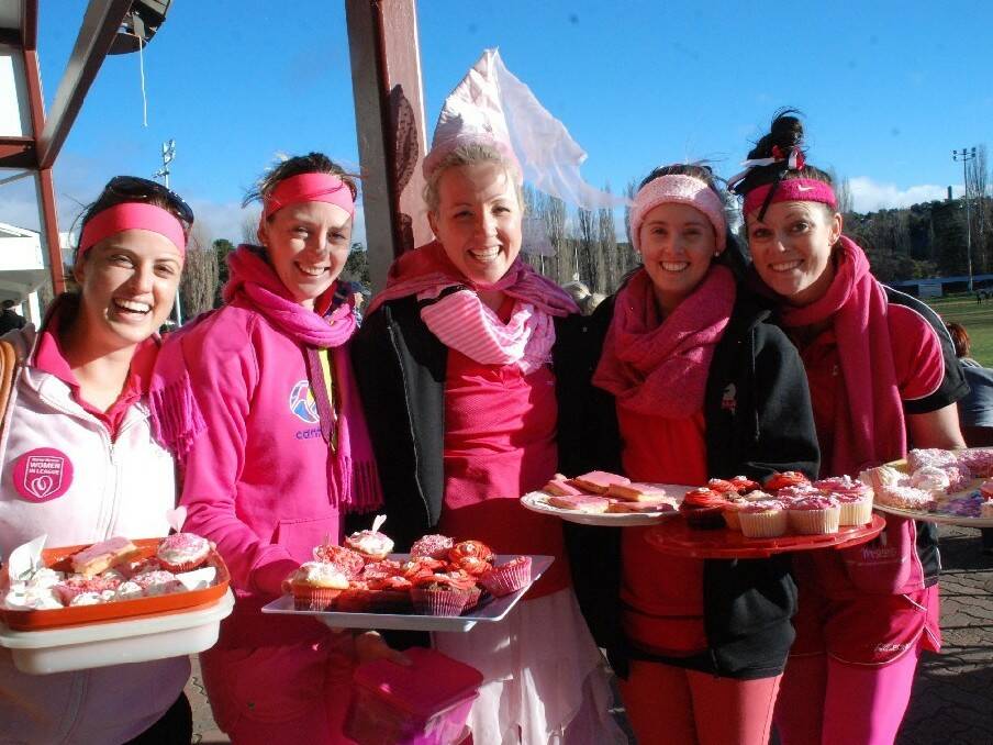  More than $1,800 was raised for the McGrath Foundation as part of the Cooma Stallions Ladies Day on Sunday. The club's league tag side the Fillies put on a special pink themed high tea at the Cooma Showground. Pictured is Monique and Patrice Ingram, Sheila Sillery, Anna Steel and Maree Ingram serving some pink treats to the footy fans.