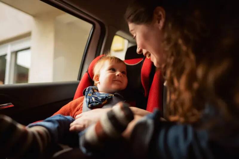 Is it legal for kids to ride in a taxi without a child seat?