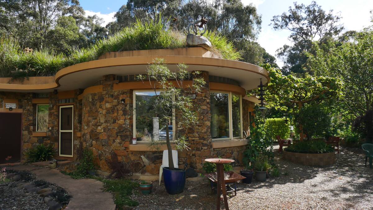 The top of the home is covered with tonnes of concrete and a small layer of soil which has been planted with Lomandra grasses. Picture by Ellouise Bailey 