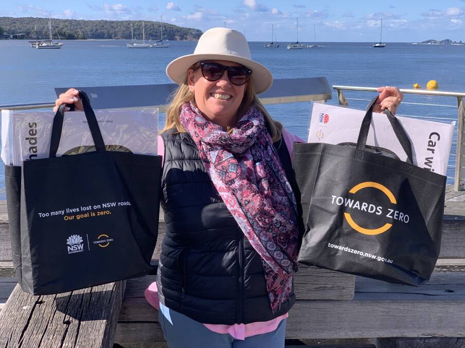 Eurobodalla Councils child development officer Jenny Hogg gave out road safety showbags in Batemans Bay on Monday for National Road Safety Week. Photo: Supplied