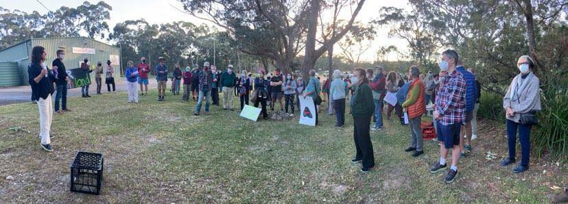 COMMUNITY LAND: Broulee residents and friends meet outside the RFS shed in Broulee to protest the potential sale of a piece of community land. Photo: Supplied. 