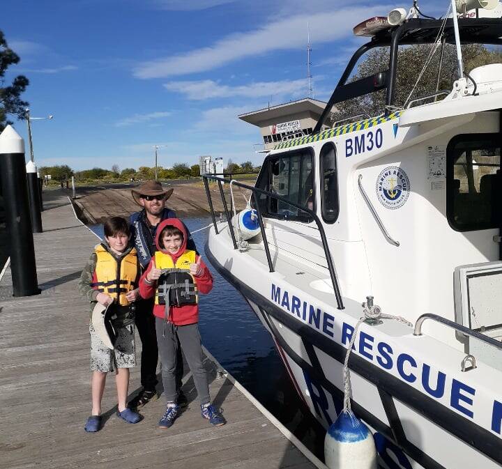 HEAVY WINDS: A father and his sons were rescued off Mossy Point on the weekend after their runabout's engine failed. Photo: Marine Rescue Batemans Bay. 