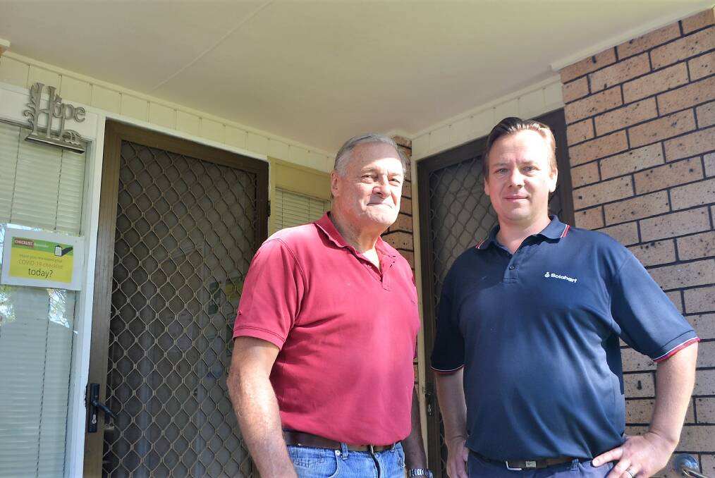 Hope House secretary Peter Vincent with Solahart's Michael Blackmore. Photo: Maeve Bannister