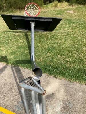 RESIDENTS HEARTBROKEN: A vandalised basketball post at Jack Buckley Park in Tomakin will be replaced, but not immediately.