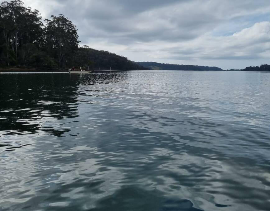 An oil spill threatened an Oyster Farm in Wagonga Inlet last Thursday, but was saved thanks to the work of Fire and Rescue crews. Picture: Batemans Bay Fire and Rescue
