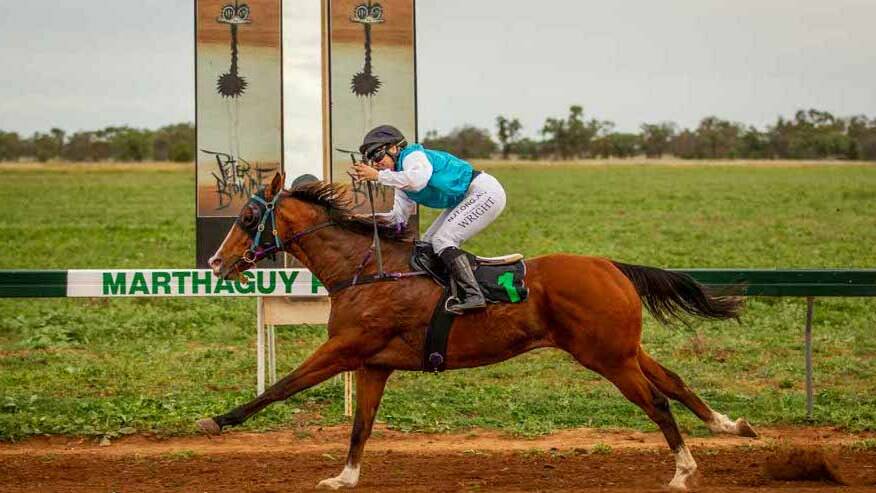 Maddy Wright crosses the finishing post at Marthaguy, one of her four wins. Picture: Racing Photography
