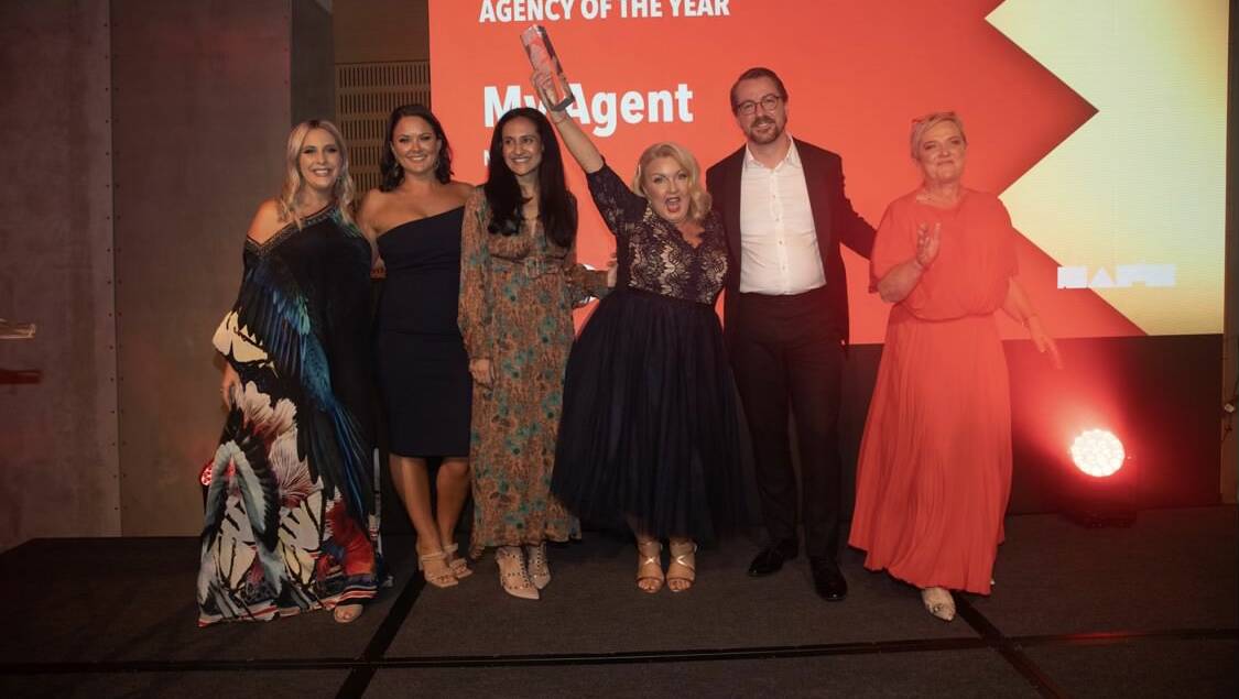 Christine Ewin and her team after winning the Small Residential Agency of the Year award.