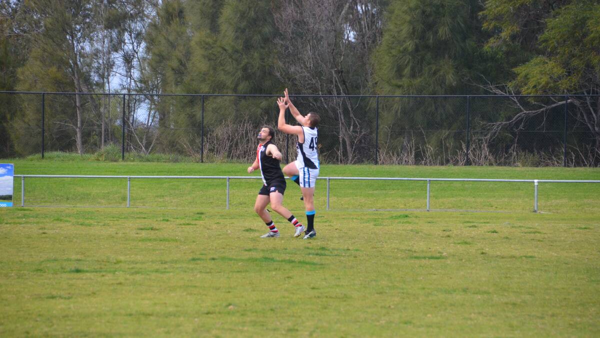 Brett Garland, pictured playing against Ainslie in 2021, kicked five goals in a big Seahawks win over Belconnen.