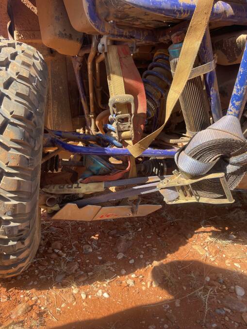 The temporary fix Matt Lavis had to do on his buggy after a trailing arm snapped during day one of racing.