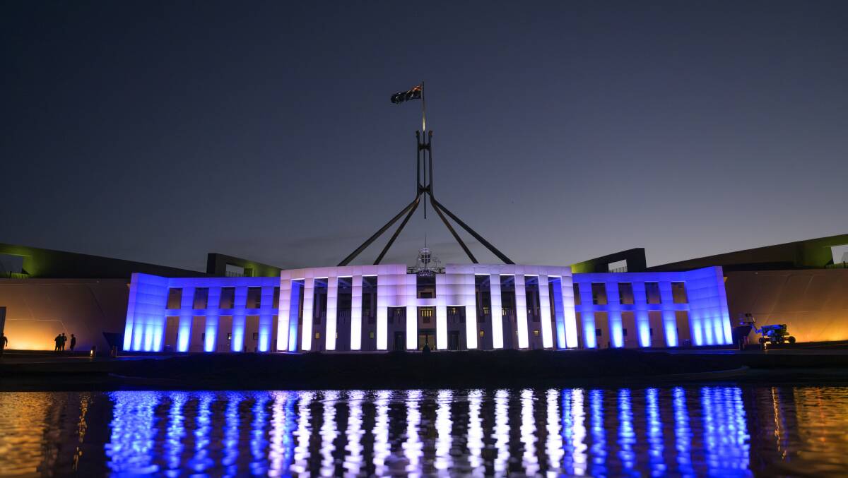 Parliament House lit up in blue and white for Israel on Tuesday. Picture by Keegan Carroll