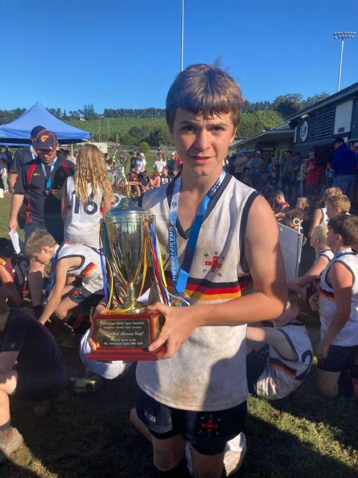 Blair Wheatley with the champions trophy at the Coffs Harbour tournament.
Photo: supplied