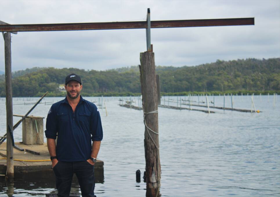 Ewan McAsh at his oyster farm on the Clyde river.
Photo: James Tugwell