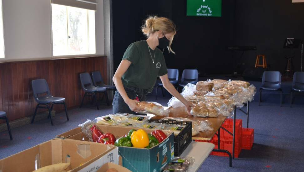 Community Outreach Officer, Lillie Lack organising fresh food for The Food Hub. Photo: Maeve Bannister