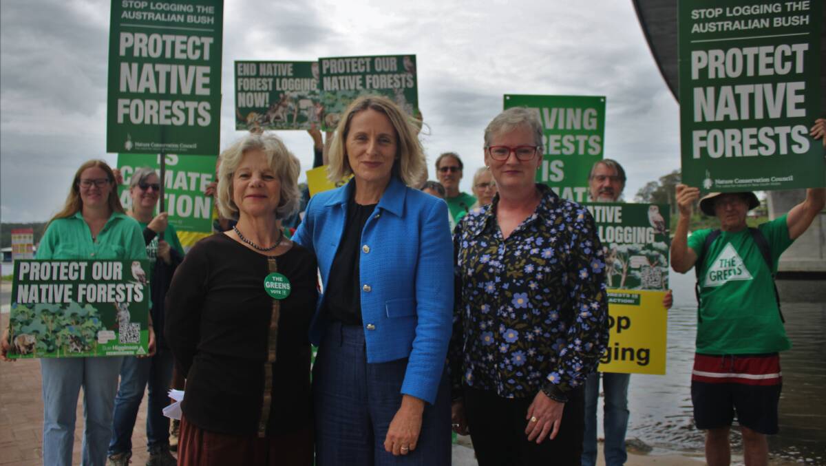 Greens candidate for Bega Cathy Griff, MP Sue Higginson and candidate for the South Coast Amanda Findley with supporters on the Batemans Bay foreshore.