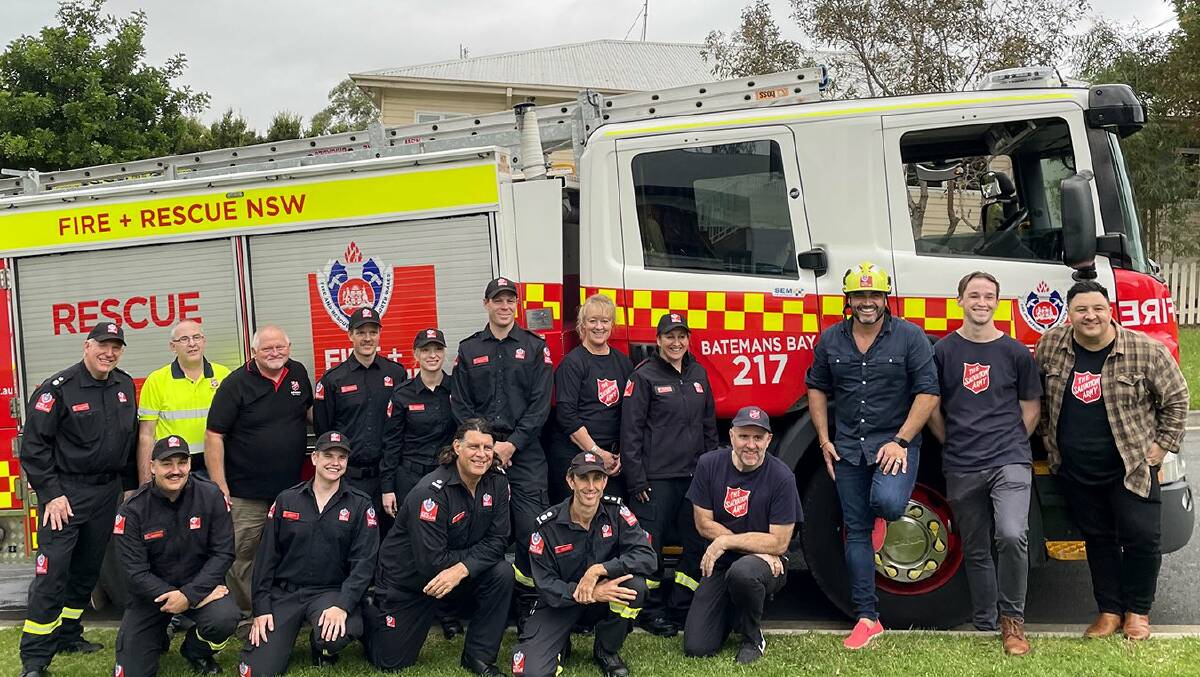 Staff from Batemans Bay Fire and Rescue with celebrity chef Miguel Maestre filming for the Living Room.
Photo: supplied