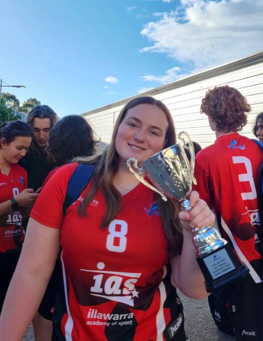 Shanae Alvey with the trophy for a recent tournament win with the Illawarra Academy of Sport. Picture: supplied