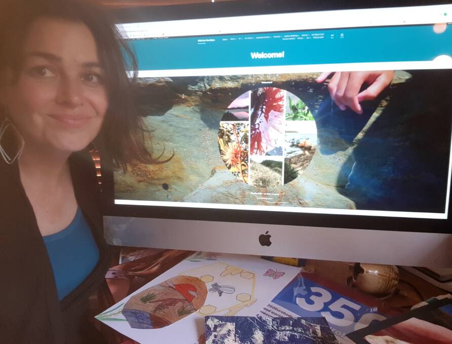 WOOEE coordinator and digital producer Magella Blinksell with some of the artwork contributions and the newly launched blog.
Photograph: supplied