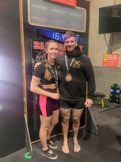 DYNAMIC DUO: Chantelle (left) with her coach Manny Tsiolakis of Dynamis Strength. Picture: Supplied. 