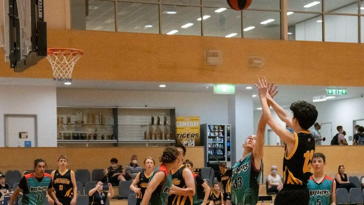 IT ALL COMES DOWN TO THIS: #33 Marley Wilson defending a shot against the Shoalhaven Tigers Black. Photo: Shoalhaven Basketball Association.