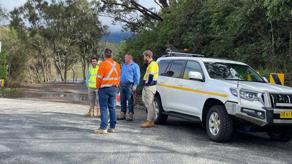 Representatives from Transport for NSW had arranged to meet a number of specialist organisations to discuss essential work on Wallaga Lake Bridge next year. They saw first hand how vulnerable the bridge and causeway are. Picture by Marion Williams