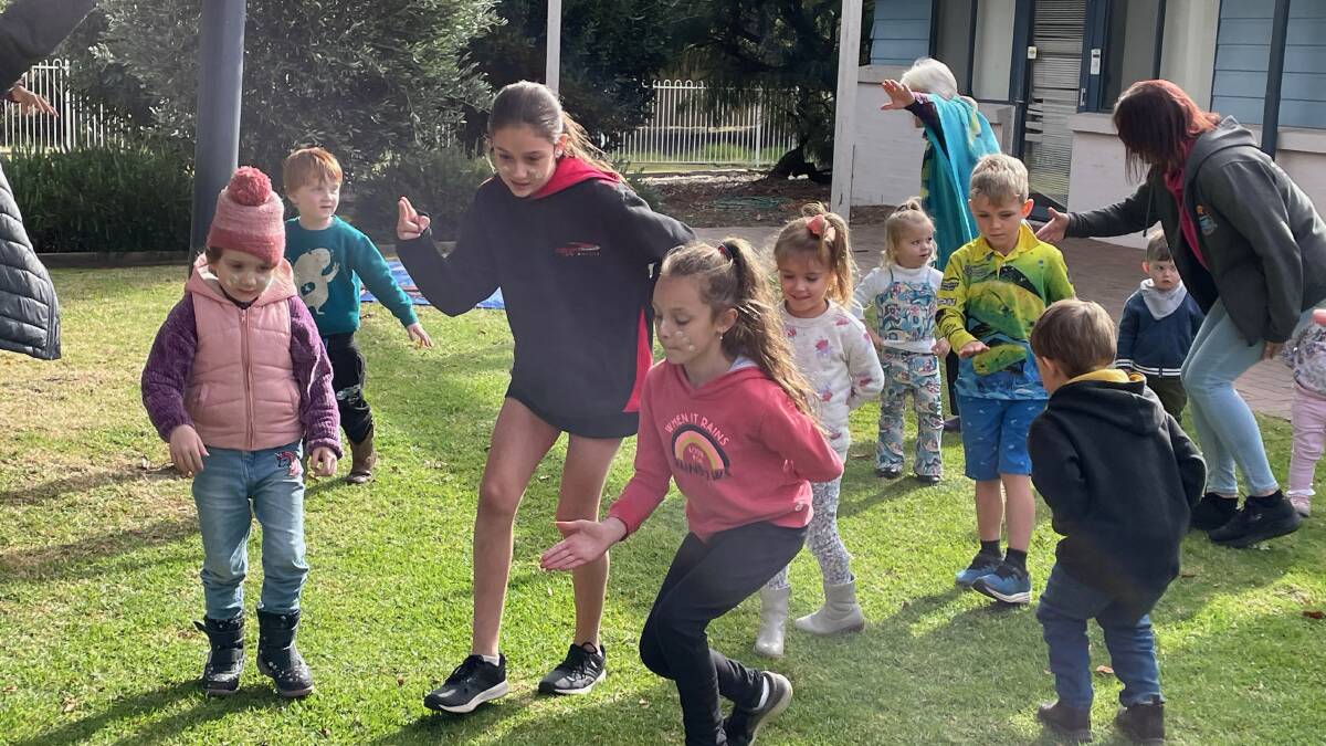 Nigel Stewart got the young and young-at- heart dancing at Narooma Library's NAIDOC cultural workshop on Thursday, July 6. Picture by Marion Williams.