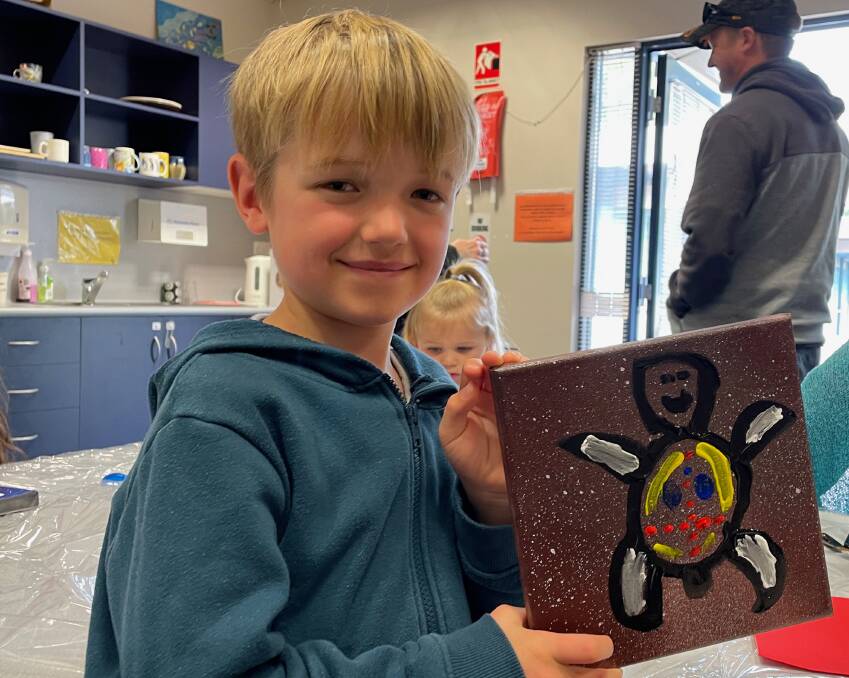 After dancing outside, the children did craft, including painting, at Narooma Library's NAIDOC cultural workshop on July 6. Picture by Marion Williams.