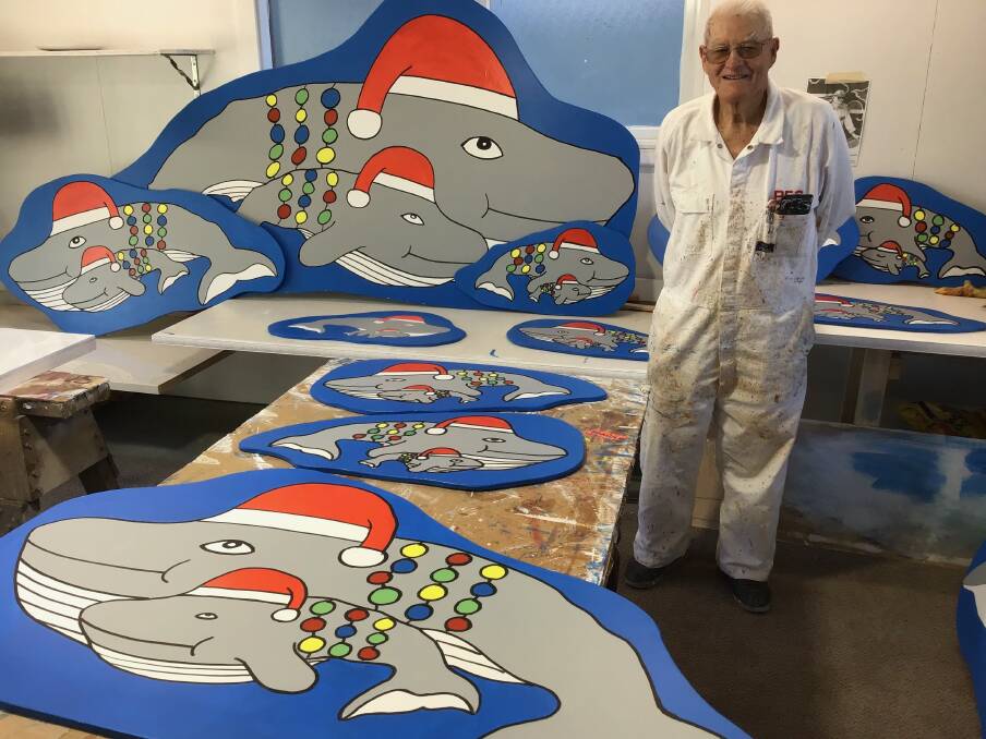 Although he is in his early 90s, Narooma Community Men's Shed member Reg is still going strong. He is one of the many people responsible for the colourful whales that are popular with locals and visitors. Picture by Martin Cooper