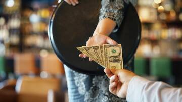 The Big Question: Has the tipping culture gone too far in the US?