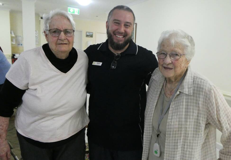 From left: Banksia Lodge resident Sylvia Spiller, enrolled nurse Ahmed Loze and resident Alice Vickery. Picture supplied