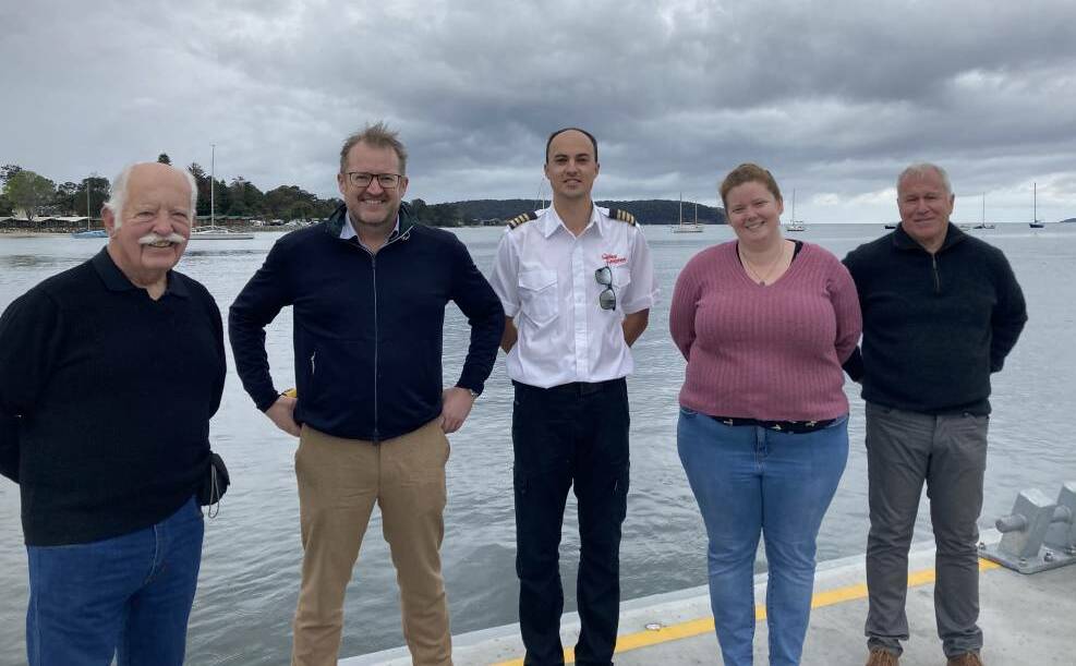 From left: Batemans Bay Business Chamber committee member Charles Stuart, Sydney Seaplanes managing director Aaron Shaw, pilot Nick Bone, Councillor Amber Schutz and chamber president David Maclachlan at the Clyde River in September 2022. Picture file