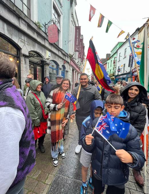 Gerard and his partner Sam Dennis represented Australia and Australian First Nations people with flags on the streets of Galway, Ireland. Picture via Narooma Oyster Festival/Facebook