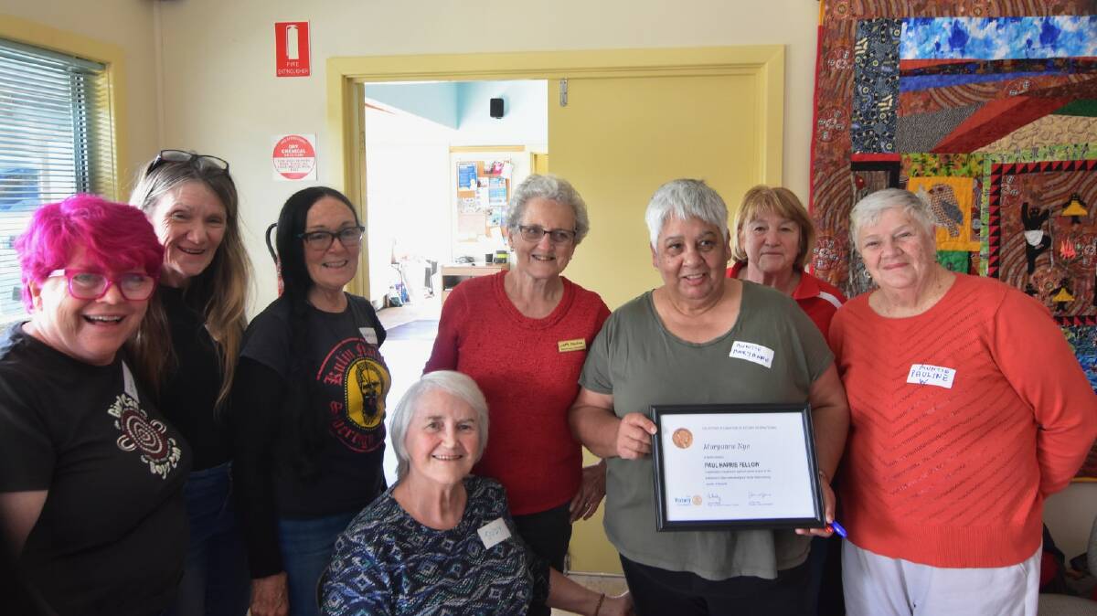 Boomerang Meeting Place volunteers celebrated with Aunty Maryanne Nye when she was given the Paul Harris Fellow Award for her contribution to Rotary Batemans Bay. Picture supplied