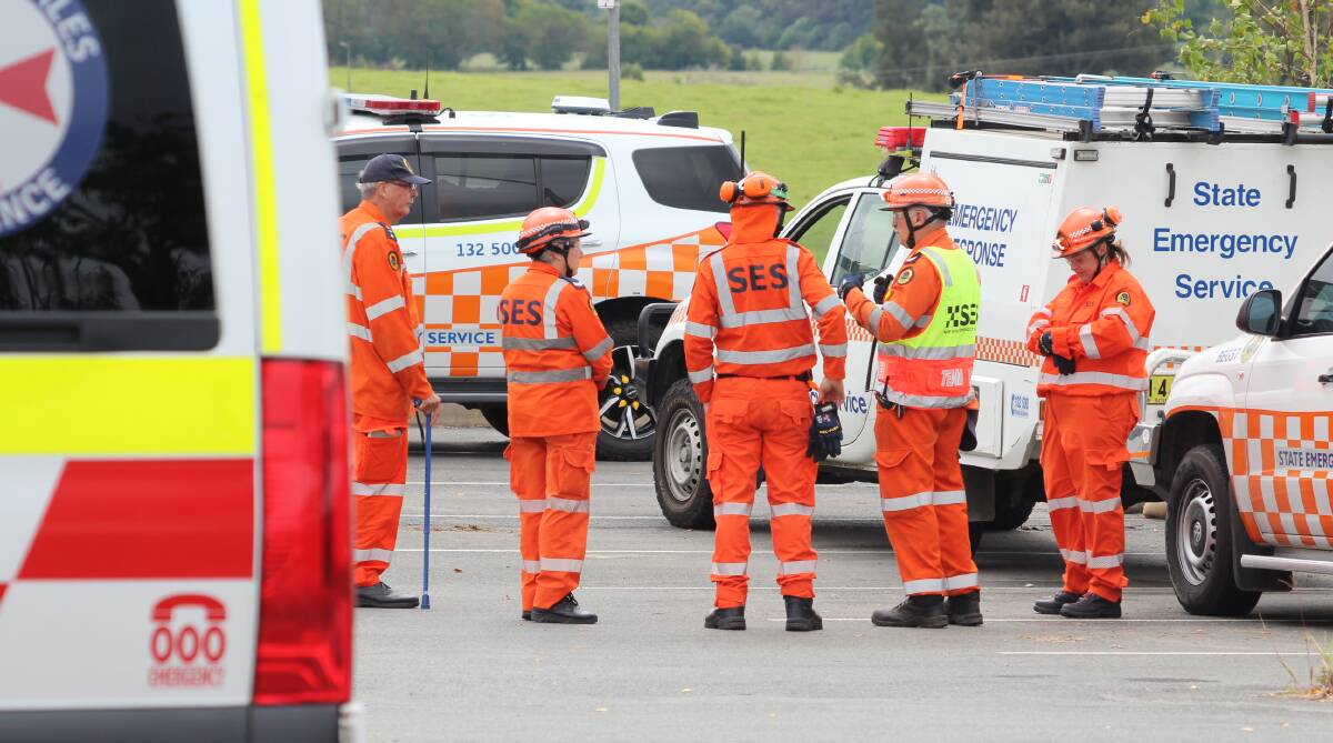 SES debrief after participating in the South East Regional Hospital's emergency simulation day, Local Commander John Mills on the far left. Picture by James Parker