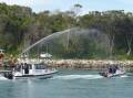 A hero's welcome on a beautiful day on Wagonga Inlet as Narooma 30 returns home. Picture supplied.