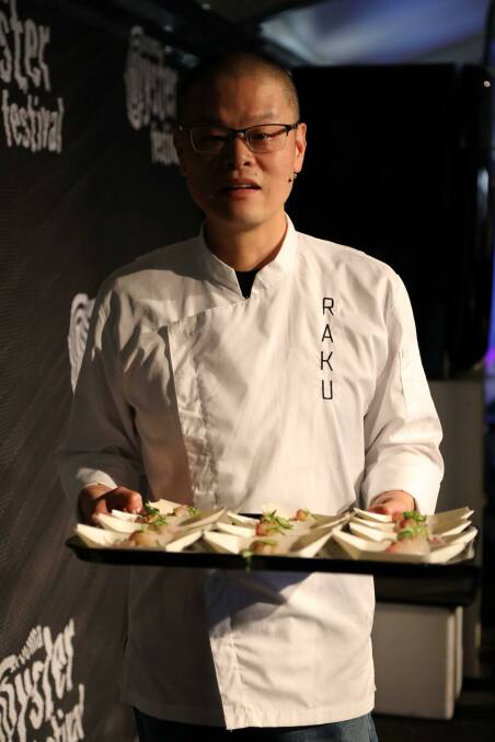 Hao Chen serving kingfish sashimi with yuku truffle dressing. Picture by Vic Silk.