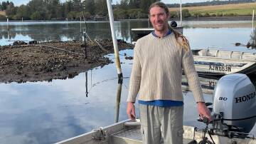 Damon Fernihough, a first generation oyster farmer, has embraced the lifestyle. Picture by Vic Silk.