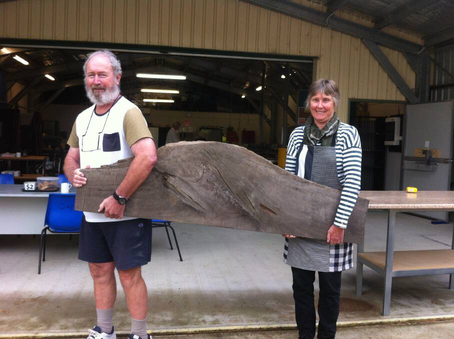 John Clark and Ann Rich preparing a slab. You wouldn't want to drink one before lifting one of these! Ann Rich loves working with such timber.