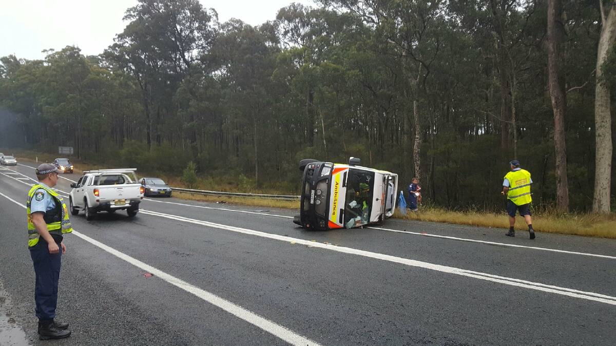 An ambulance overturned on the Princes Highway south of Batemans Bay on Monday, March 18.