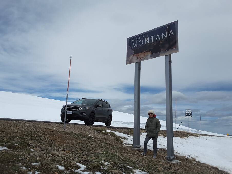 Joosik Debenham takes a break from the road in an icy Montana spring time.