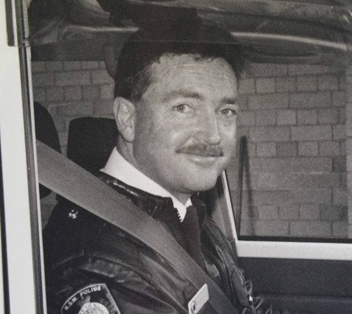 DRIVE TIME: Sgt Bob Moore will be farewelled after 40 years' service in the police force, including in the Eurobodalla Shire.