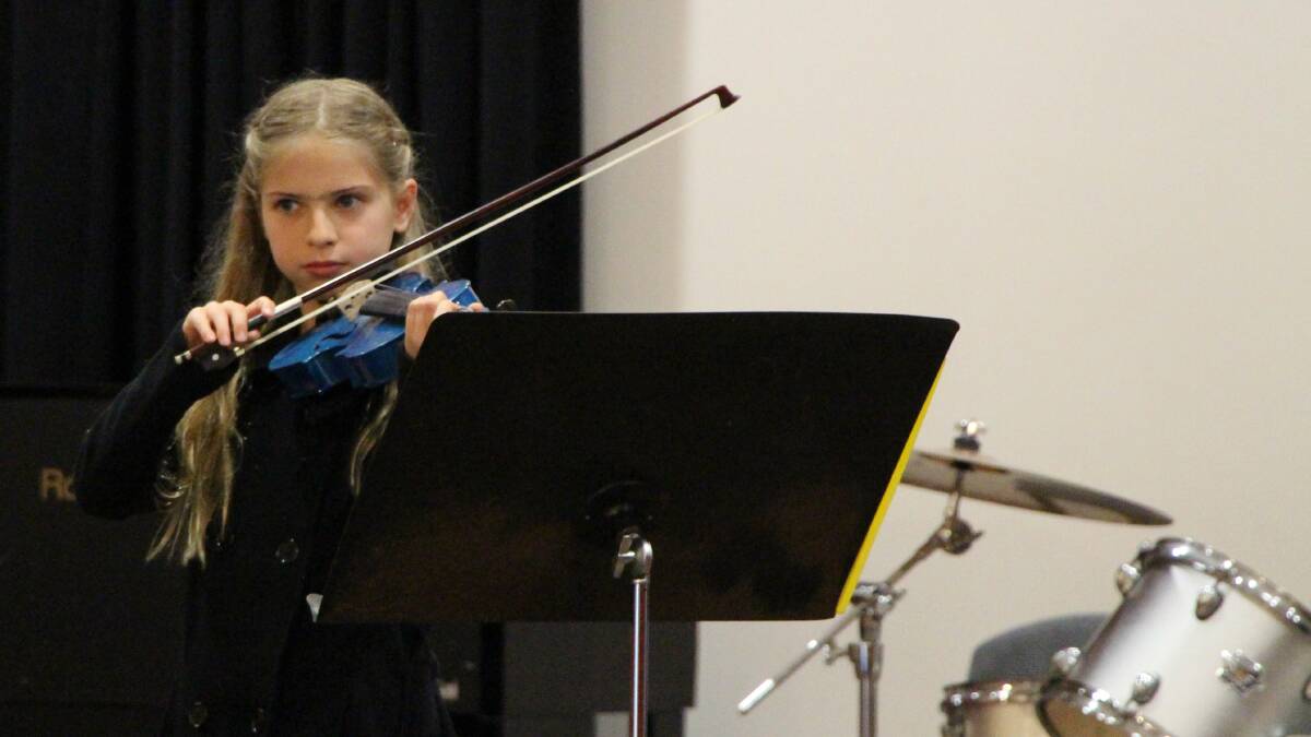 FINALIST: Mia May plays a contemporary piece on violin at the auditions, to win place in the St Cecilia concert on Sunday.