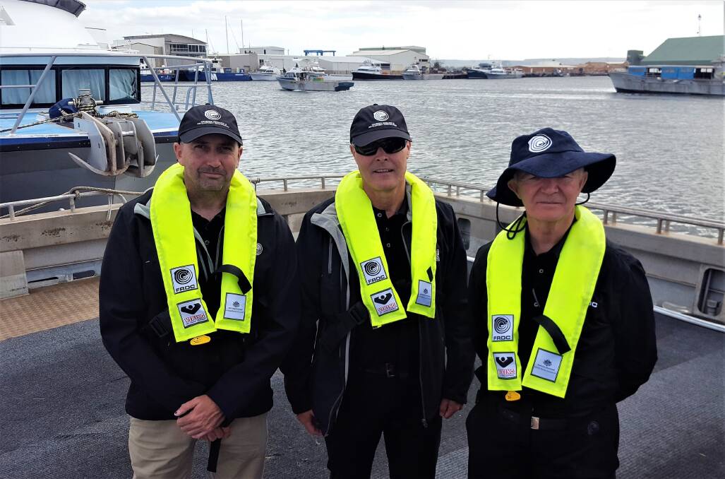 FISHING FOR SAFETY: Five deaths a year has prompted a major investment in commercial fishing safety. Fisheries Research and Development Corporation managing director Dr Patrick Hone (centre) and general managers John Wilson (right) and Crispian Ash.