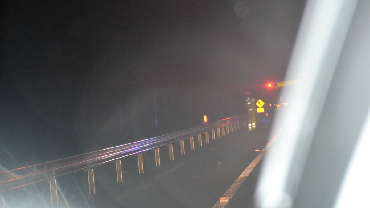 Emergency crews on the Princes Highway on Monday evening after trees fell in two places.