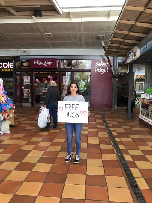 NOT SO FREE: Pauline Siteaud offered free hugs in a Batemans Bay shopping centre but found she was not free to do so.