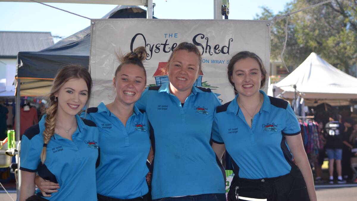 Jade Norris, third from left, with fellow Clyde River oyster farming women. From left, Jordan Andrighetto, Lily Griffiths and Darcy Hesketh. Jordan and Darcy are fifth-generation oyster personnel. Lily is also from an established oyster family.