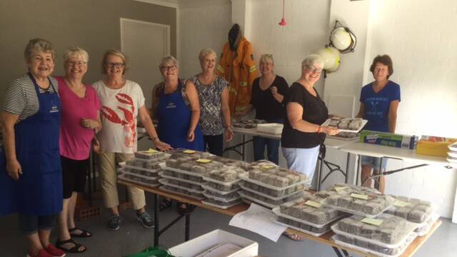 DRIVE FOR SUCCESS: Batemans Bay Quota Club members with lots of lamingtons.