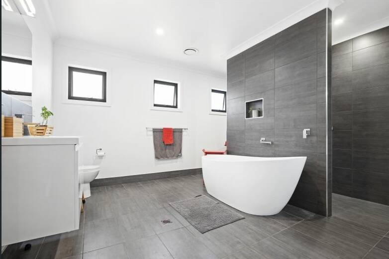 VICTORIOUSLY CLEAN: The bathroom at 6 Victor Circuit Batehaven will have you in a lather.