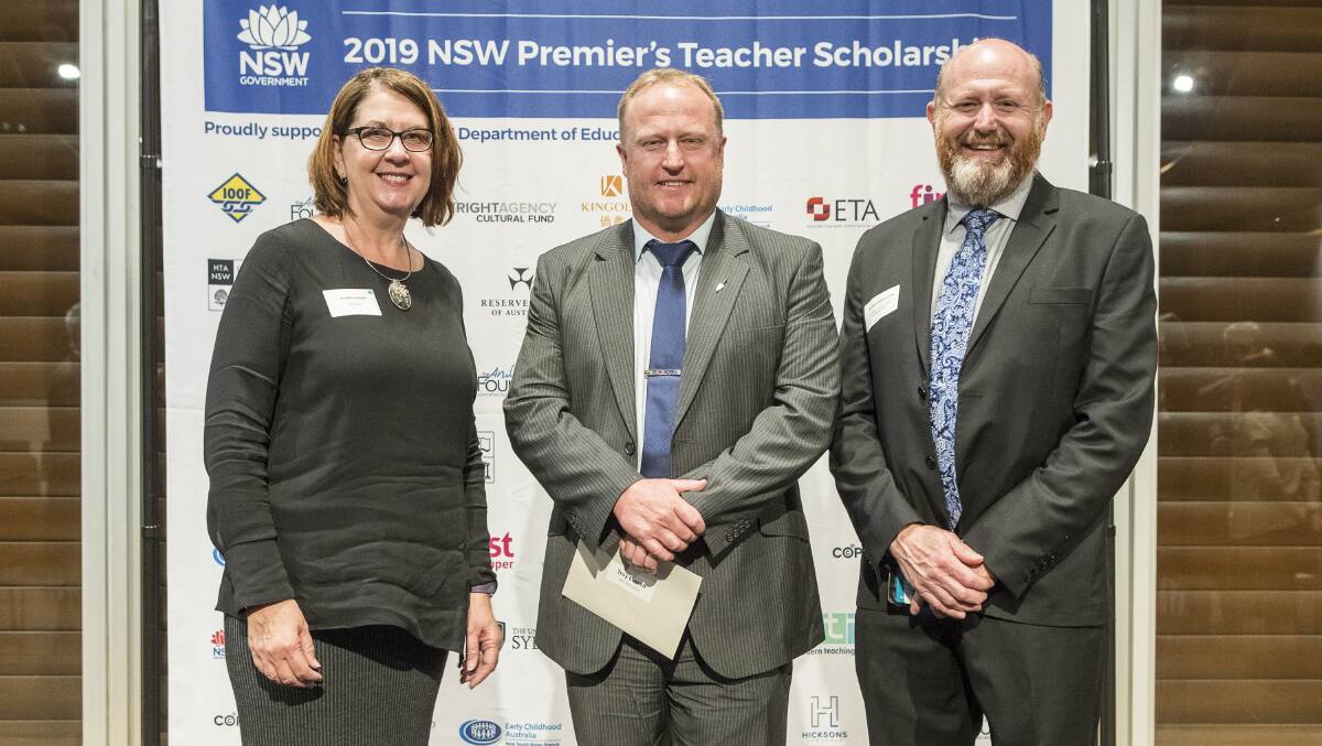 BUILDING FUTURE: Moruya TAFE's Troy Everett, centre, with Kerry Penton and Chris Outten at the Premier’s Teacher Scholarship awards.