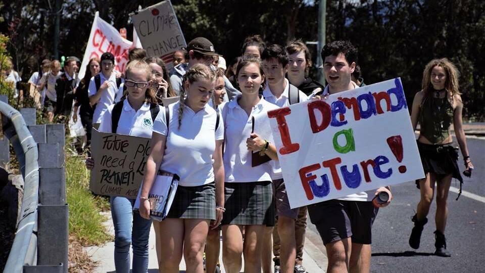 READER CALLS FOR ACTION: Students from Narooma High School take part in a protest against climate change inaction on Friday, November 30, 2018.