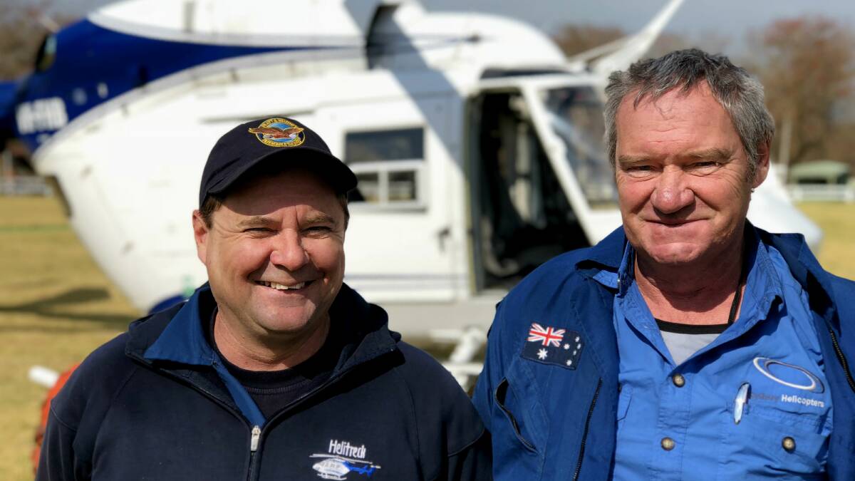 HERO: Pilot Allan Tull (right) before his last flight. He is pictured with fellow pilot Kevin Drake. Photo: John Hanscombe